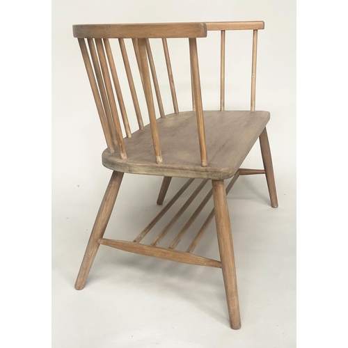 106 - HALL SEAT, English 1970s beech and elm in the manner of Ercol with enclosed rail back and shaped sea... 