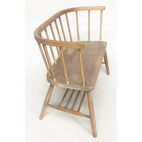 106 - HALL SEAT, English 1970s beech and elm in the manner of Ercol with enclosed rail back and shaped sea... 