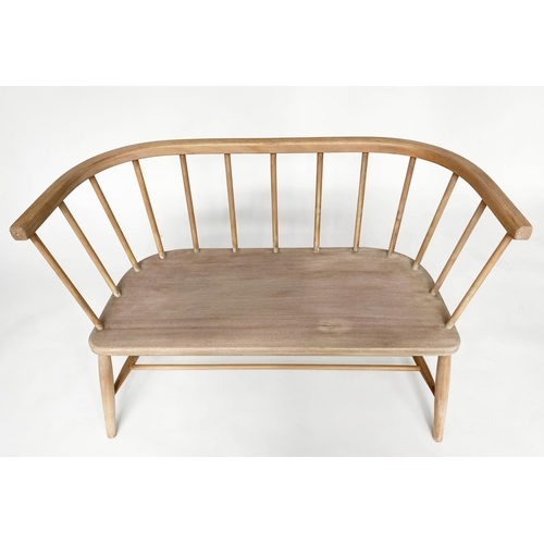 106 - HALL SEAT, English 1970s beech and elm in the manner of Ercol with enclosed rail back and shaped sea... 