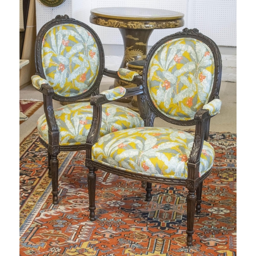 232 - FAUTEUILS, 92cm H x 60cm, a pair, early 20th century French stained beech in new leaf patterned upho... 