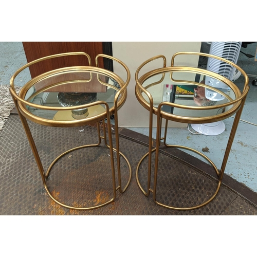 249 - SIDE TABLES, a pair, 64cm x 48cm diam., 1970s Italian style, gilt metal, mirrored top. (2)