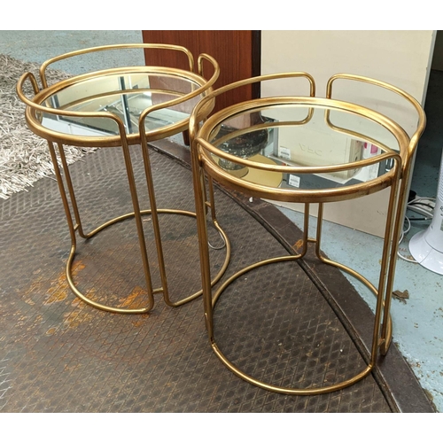 249 - SIDE TABLES, a pair, 64cm x 48cm diam., 1970s Italian style, gilt metal, mirrored top. (2)