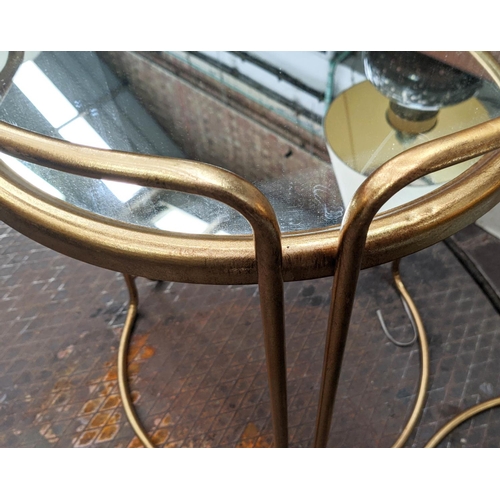 249 - SIDE TABLES, a pair, 64cm x 48cm diam., 1970s Italian style, gilt metal, mirrored top. (2)