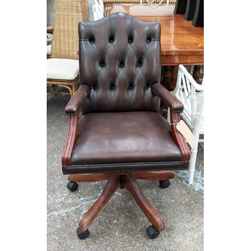 340 - DESK CHAIR, brown leather, deep buttoned back, swivel action, mahogany finish, 100cm H x 56cm W x 65... 