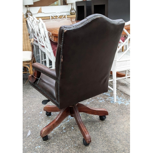 340 - DESK CHAIR, brown leather, deep buttoned back, swivel action, mahogany finish, 100cm H x 56cm W x 65... 