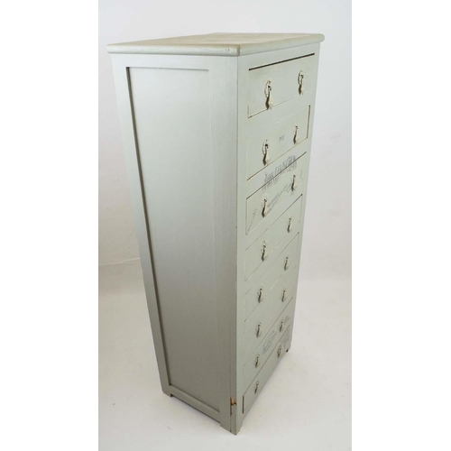 311 - CHILDREN'S DRESSING CHEST, eight drawers painted grey with John Lewis insignia, 128cm H x 52cm x 36c... 