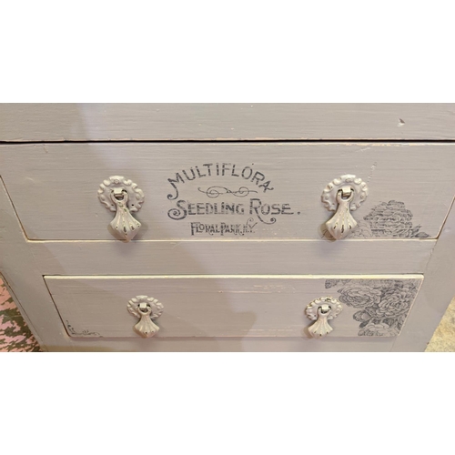 311 - CHILDREN'S DRESSING CHEST, eight drawers painted grey with John Lewis insignia, 128cm H x 52cm x 36c... 