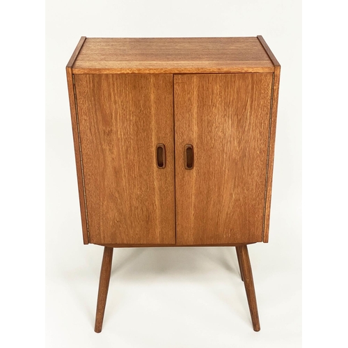 318 - CABINET, 1970s teak, with two doors enclosing a shelf on splayed supports, 61cm W x 36cm D x 100cm H... 