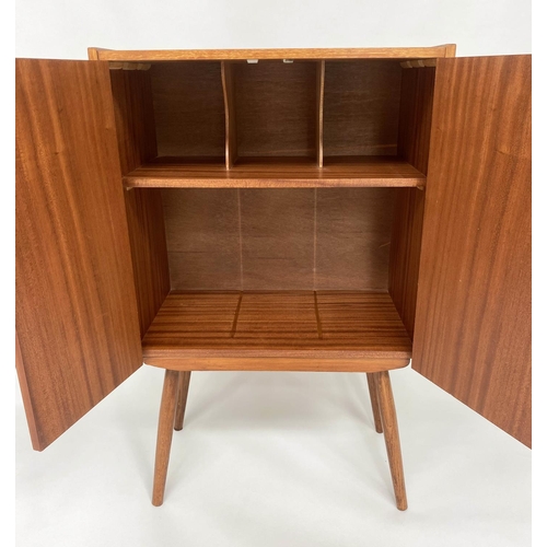 318 - CABINET, 1970s teak, with two doors enclosing a shelf on splayed supports, 61cm W x 36cm D x 100cm H... 