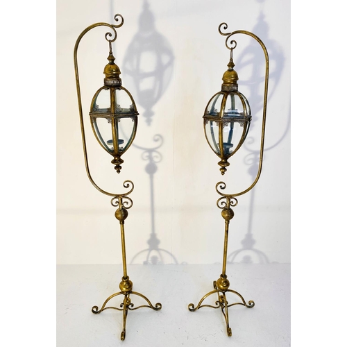 501 - FLOOR STANDING LANTERNS, gilt metal, regency style, 163cm x 35cm x 30cm.