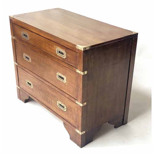 118 - CAMPAIGN STYLE CHEST, oak and brass bound with three long drawers, 75cm x 40cm x 60cm H.