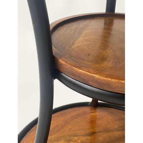 136 - COCKTAIL TABLE, three tier circular lipped and waisted, mango wood and metal framed, 46cm W x 64cm H... 