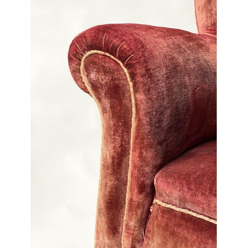 93 - ARMCHAIR, early 20th century garnet and faded velvet upholstery with scroll arms, 95cm W.