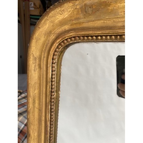 123 - OVERMANTEL MIRROR, 19th century French giltwood with arched rectangular beaded and moulded frame, 10... 