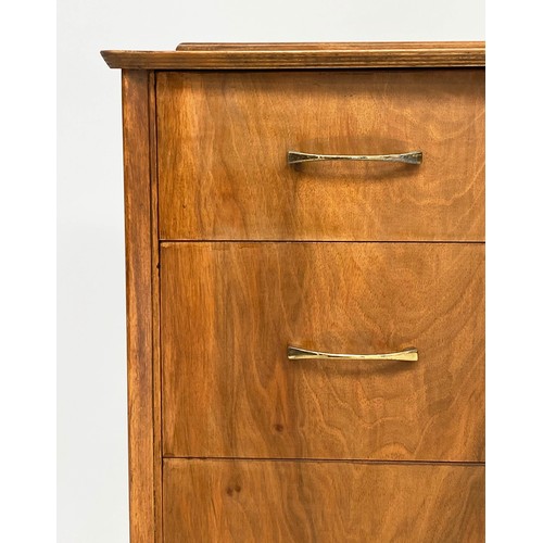 135 - CHEST, 1970s figured walnut with three drawers and splay brass tipped tapering supports, 64cm x 42cm... 