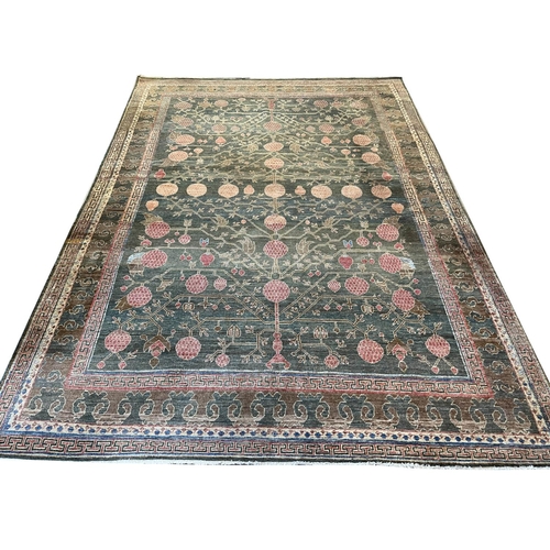 111 - FINE KHOTAN POMEGRANITE DESIGN CARPET, 313cm x 223cm.