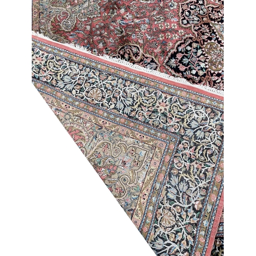 120 - FINE KASHMIR SILK CARPET, 292cm x 210cm.