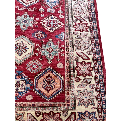 128 - FINE KAZAK CARPET, 330cm x 245cm.