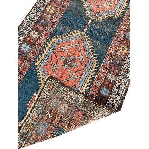 130 - ANTIQUE PERSIAN HERIZ RUNNER, 440cm x 95cm.