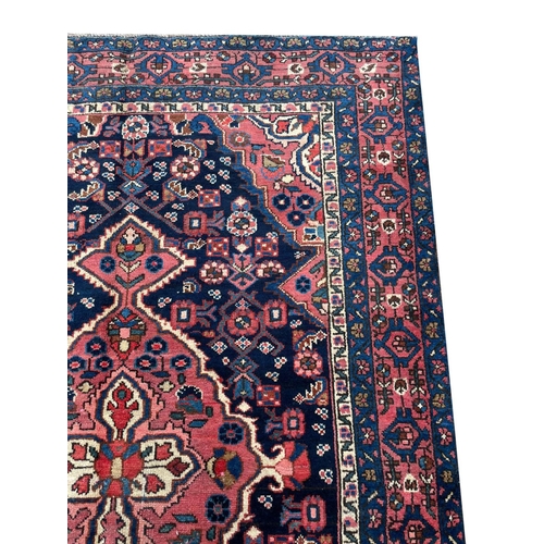 131 - ANTIQUE PERSIAN MALAYER RUG, 200cm x 130cm.