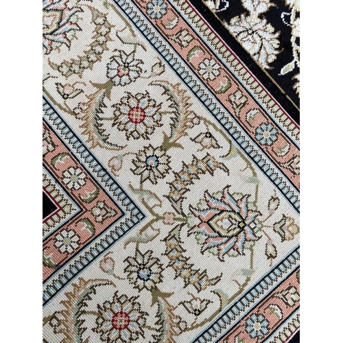 138 - FINE SILK KEREKE DESIGN RUG, 185cm x 127cm.