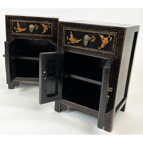 152 - CHINOISERIE BEDSIDE CABINETS, a pair, ebonised and gilt decorated, each with single drawer above two... 