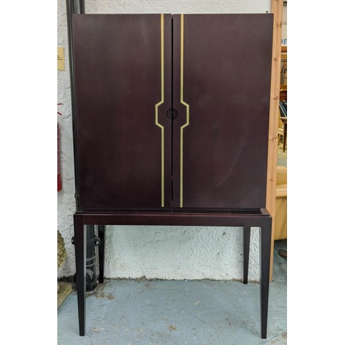 337 - JUSTIN VAN BREDA HUG CABINET, 100cm x 53cm x 166cm design on stand, mahogany veneer, brass inlay.