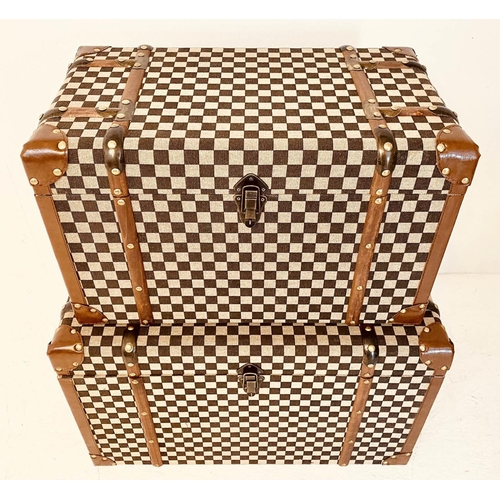 471 - TRUNKS, a graduated set of two, 1920s French style, damier style fabric covered, 42 x 72x 42.