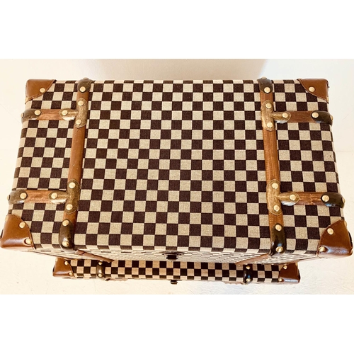 471 - TRUNKS, a graduated set of two, 1920s French style, damier style fabric covered, 42 x 72x 42.