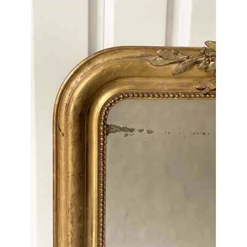 174 - OVERMANTEL MIRROR, 19th century French giltwood and gesso, arched rectangular with laurel crest and ... 