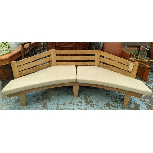 347 - CORNER BENCH, solid oak slatted and jointed with three sides and seat cushions, 232cm W.