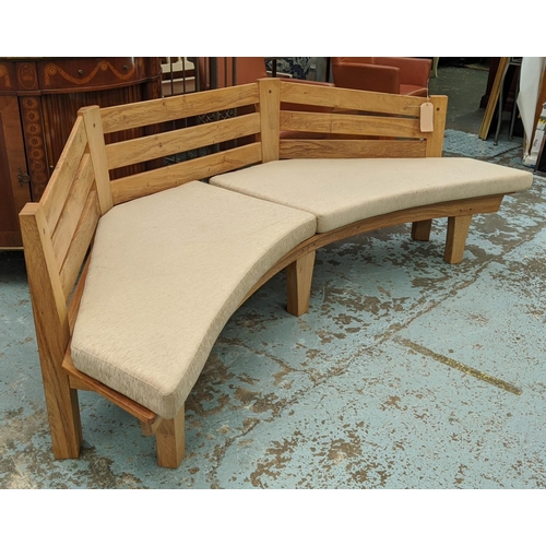 347 - CORNER BENCH, solid oak slatted and jointed with three sides and seat cushions, 232cm W.