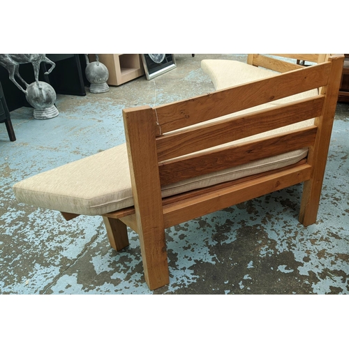 347 - CORNER BENCH, solid oak slatted and jointed with three sides and seat cushions, 232cm W.