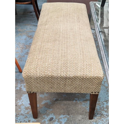 228 - HEARTH STOOL, thick woven upholstery, studded detail, 125cm x 49cm x 49cm.