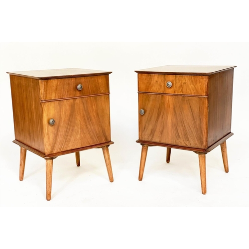 501 - BEDSIDE CABINETS, a pair, figured walnut, each with drawer and cupboard, raised upon tapering splay ... 