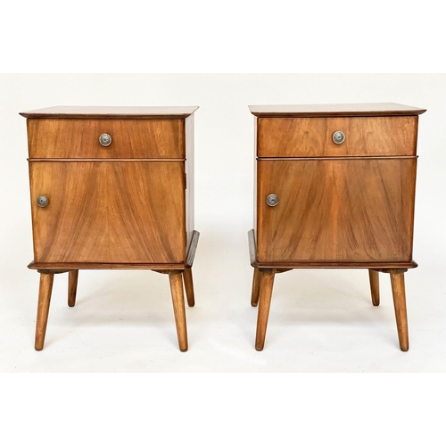 501 - BEDSIDE CABINETS, a pair, figured walnut, each with drawer and cupboard, raised upon tapering splay ... 