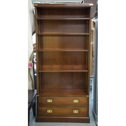 235 - BOOKCASE BY KENNEDY, 211cm H x 99cm x 41cm, campaign style mahogany and brass bound with adjustable ... 