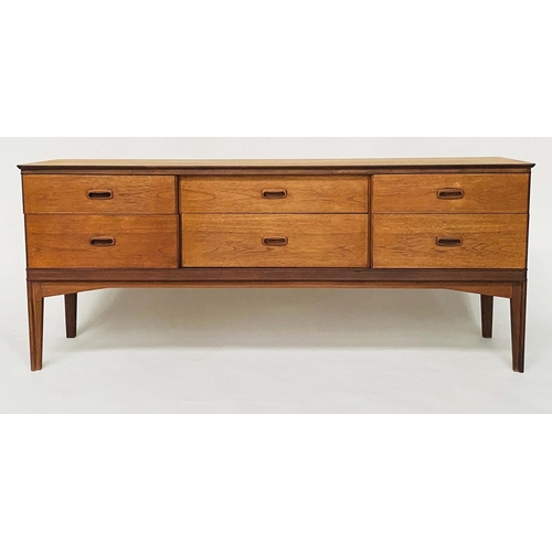 321 - AUSTIN SUITE LOW CHEST,  1970's teak with contrast carcass and recessed handles stamped, 164cm x 43c... 