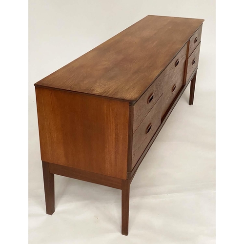 321 - AUSTIN SUITE LOW CHEST,  1970's teak with contrast carcass and recessed handles stamped, 164cm x 43c... 