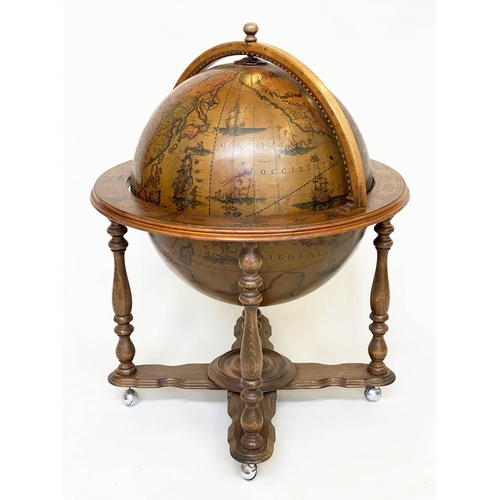 323 - GLOBE DRINKS CABINET, modelled as an antique terrestrial globe on stand with rising lid, 75cm x 100c... 