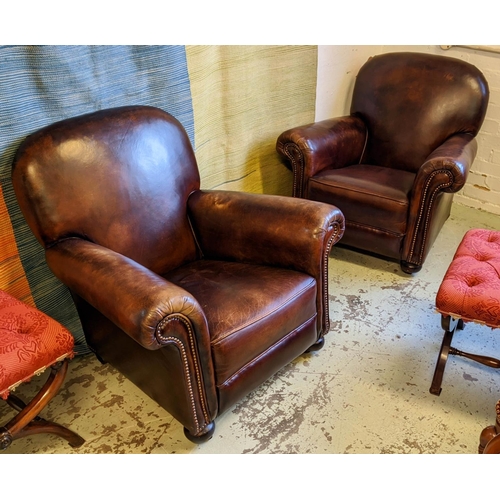 338 - CLUB ARMCHAIRS, a pair, each 87cm x 83cm H, mid 20th century brown leather. (2)