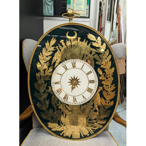 358 - WALL CLOCK, 95cm x 64cm x 13.5cm approx, oval with roman neutral face.