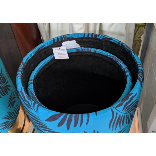 361 - NESTING BARREL STOOLS, two graduated pairs, 45cm x 35cm diam at largest, in tropical print upholster... 