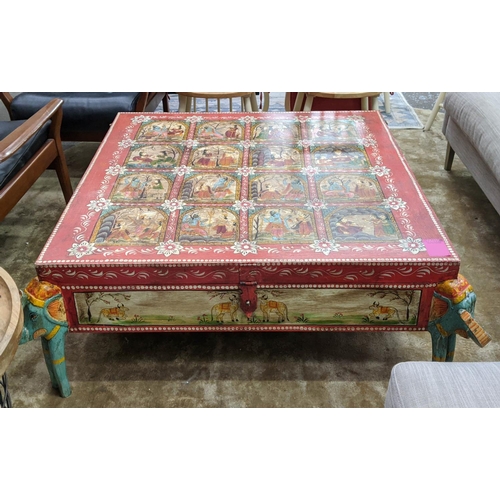 367 - INDIAN LOW TABLE, 120cm x 120cm x 42cm, painted finish with elephant shaped supports, lift up top to... 