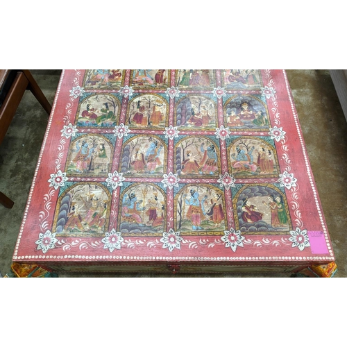 367 - INDIAN LOW TABLE, 120cm x 120cm x 42cm, painted finish with elephant shaped supports, lift up top to... 