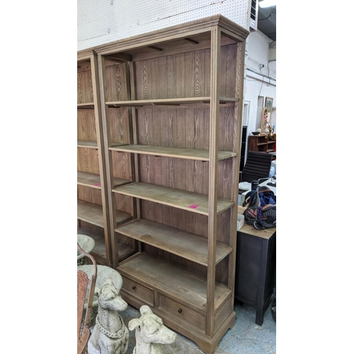 486 - BOOKCASE, 215cm x 104cm x 36cm, five shelves, with two drawers to base.