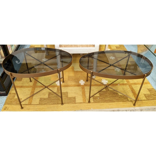 488 - SIDE TABLES, a graduated pair, 1950's Italian style, 64cm x 46cm x 45cm, smoked glass tops. (2)