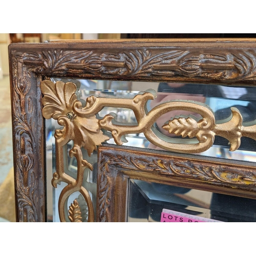 500 - WALL MIRRORS, a pair, 101cm x 151cm, French style, gilt frame with marginal mirrored plates and corn... 