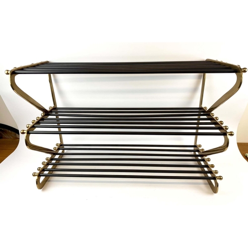 431 - SHOE RACK, 83cm W x 53.5cm H x 34cm D, 1950s Italian style, gilt metal with black painted rods.