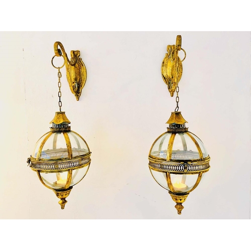 448 - GLOBULAR WALL HANGING CANDLE LANTERNS, a pair, regency style, gilt metal, 80cm drop, 25cm x 25cm.